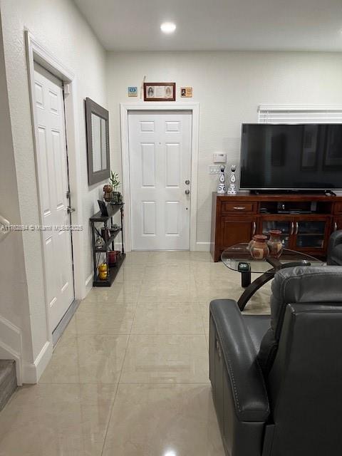 living room featuring light tile patterned floors