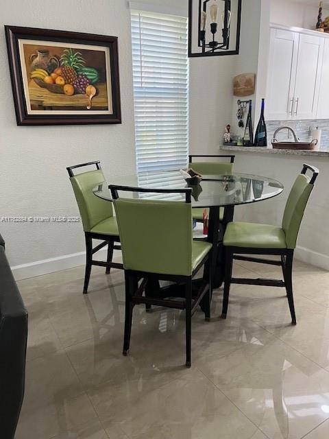 dining area with baseboards