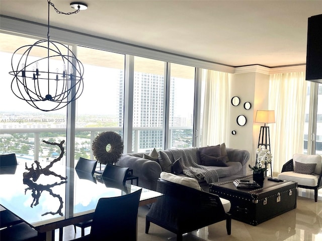 living room with a notable chandelier and expansive windows