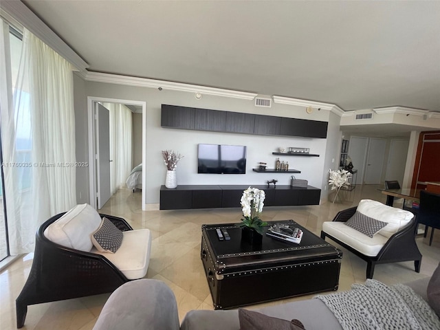 living room featuring visible vents and ornamental molding