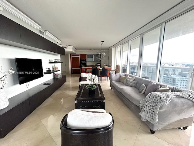 living area featuring floor to ceiling windows, visible vents, and a chandelier