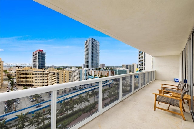 balcony featuring a city view