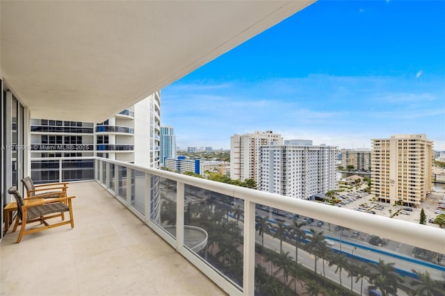 balcony featuring a view of city