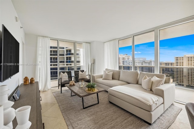 tiled living area featuring a view of city and expansive windows