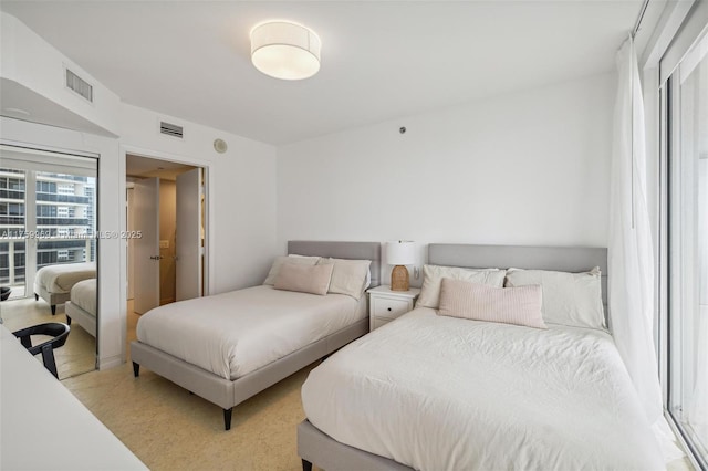 bedroom featuring visible vents