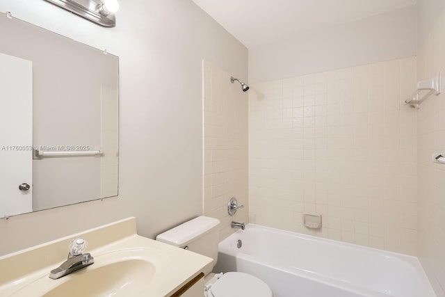 full bath featuring vanity, shower / bathing tub combination, and toilet