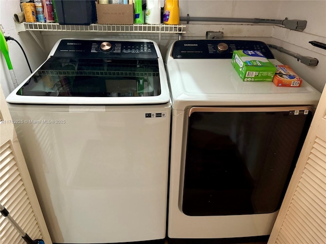 laundry area with laundry area and washing machine and dryer