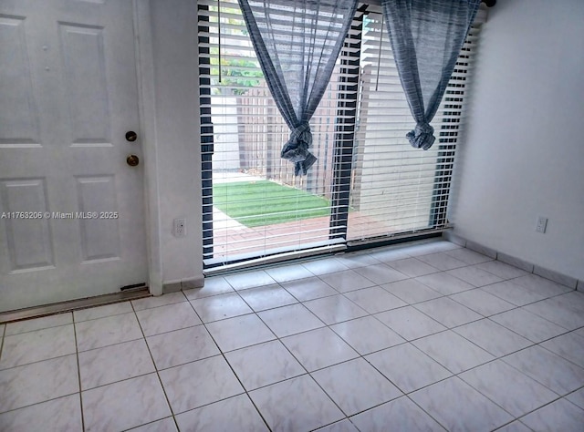 foyer with tile patterned flooring