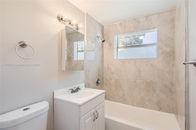 full bathroom featuring shower / washtub combination, toilet, and vanity