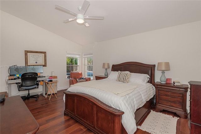 bedroom with baseboards, lofted ceiling, dark wood finished floors, and a ceiling fan