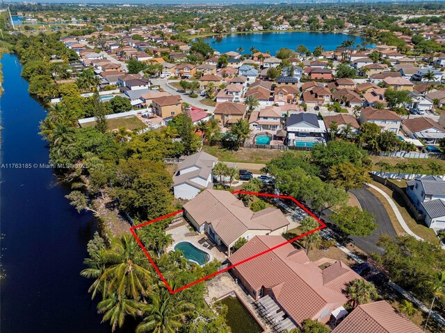 19922 NW 88th Ave, Hialeah, FL 33018 - aerial view of residential area featuring a large body of water and property boundaries highlighted