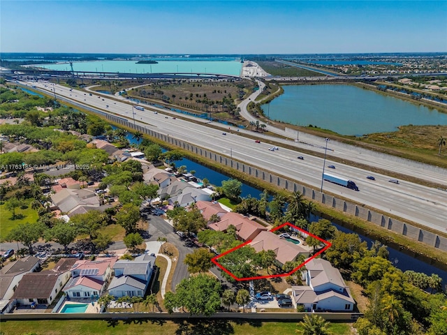 aerial view with a water view and a residential view