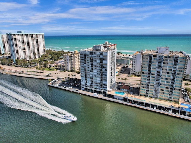 aerial view featuring a water view and a view of city