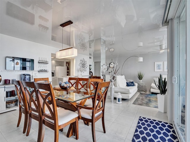 dining room featuring light tile patterned flooring