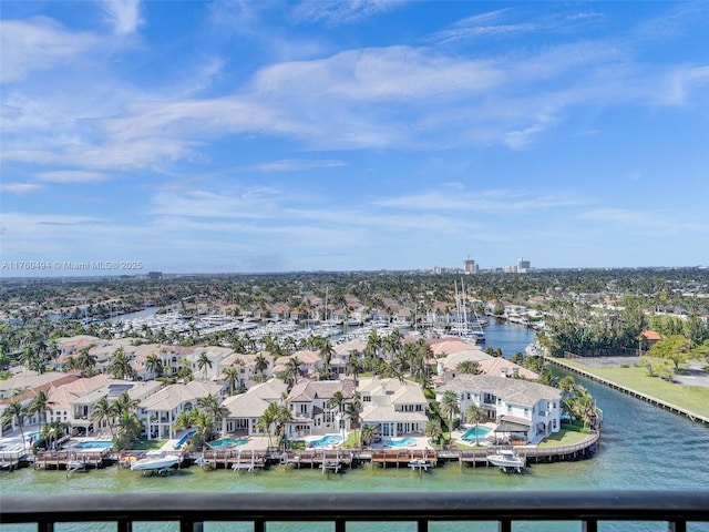 aerial view featuring a water view and a residential view