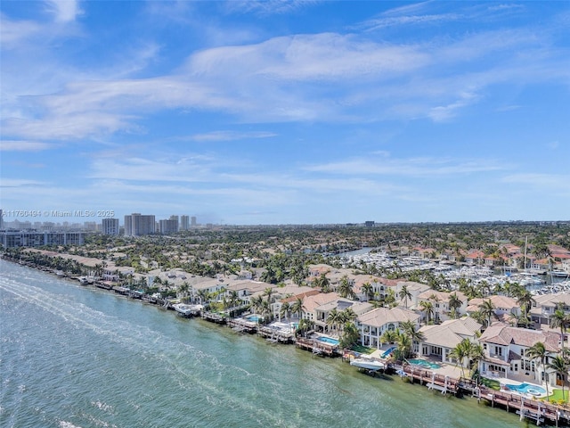 bird's eye view with a city view, a water view, and a residential view