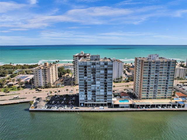 bird's eye view featuring a view of city and a water view