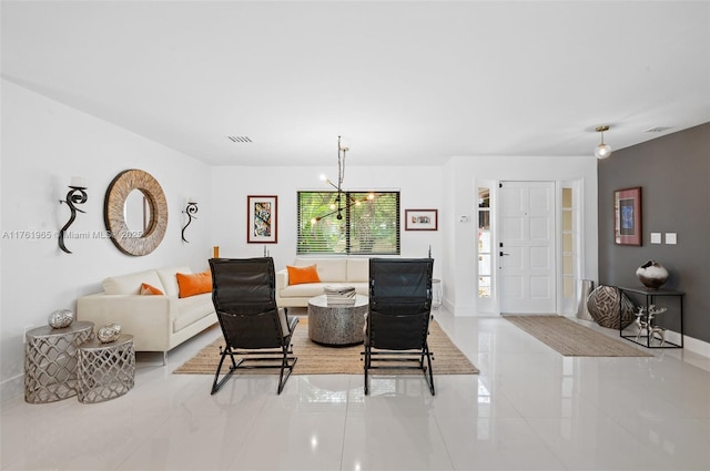 living room featuring visible vents and baseboards