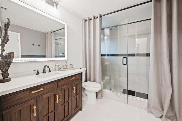 bathroom featuring tile patterned floors, visible vents, toilet, and a stall shower