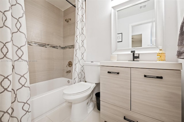 full bath featuring visible vents, vanity, toilet, and shower / tub combo