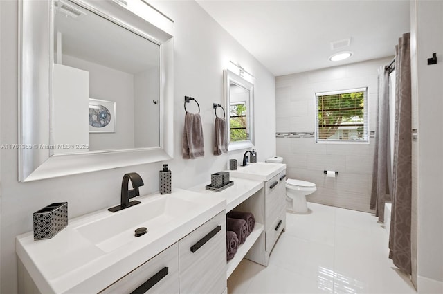 full bath featuring visible vents, vanity, toilet, and shower / tub combo