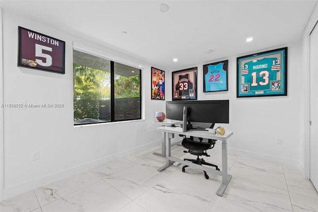 office area featuring recessed lighting, baseboards, and marble finish floor