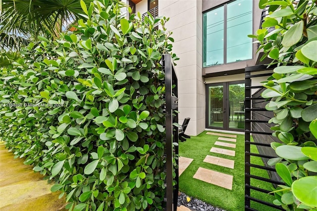 view of yard with french doors