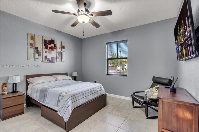 2548 SE 1st St, Homestead, FL 33033 - bedroom featuring baseboards, ceiling fan, and light tile patterned floors