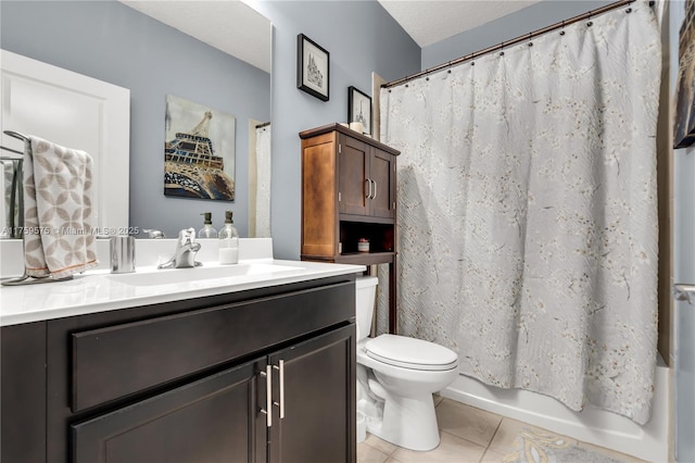 bathroom with tile patterned flooring, toilet, vanity, a textured ceiling, and shower / bathtub combination with curtain