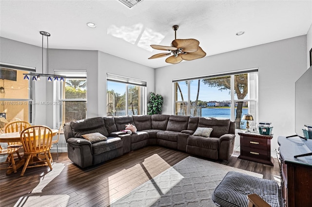 living area featuring wood finished floors, recessed lighting, and a ceiling fan