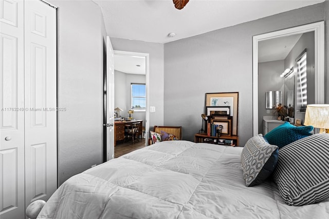 bedroom featuring ceiling fan and wood finished floors