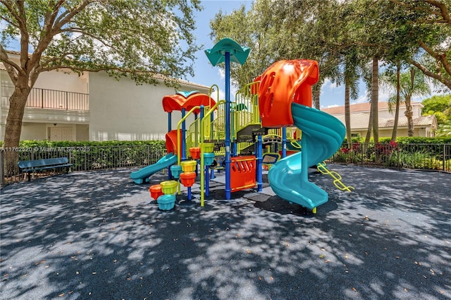 community play area featuring fence