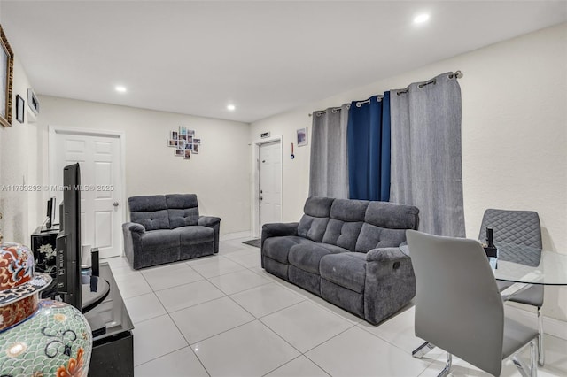 tiled living room with recessed lighting