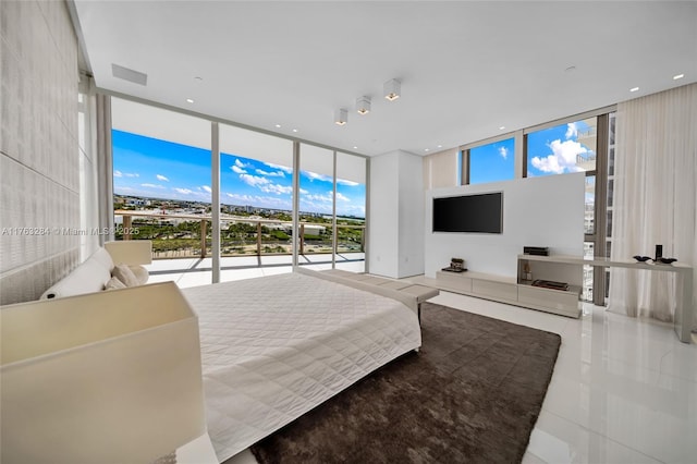 tiled bedroom featuring recessed lighting, floor to ceiling windows, and access to outside