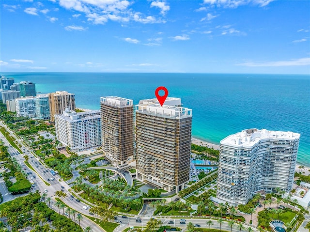 aerial view featuring a view of city and a water view