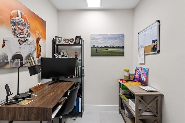 office space with baseboards