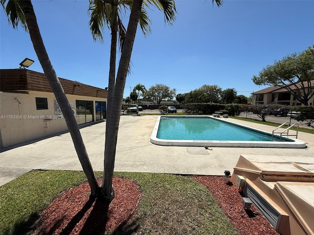 pool featuring a patio