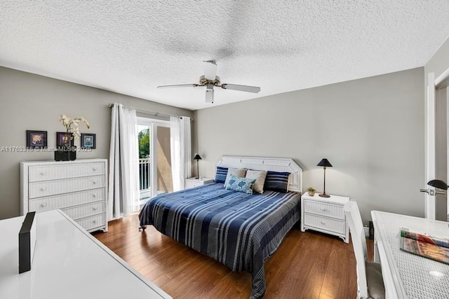 bedroom with access to exterior, a textured ceiling, ceiling fan, and wood finished floors