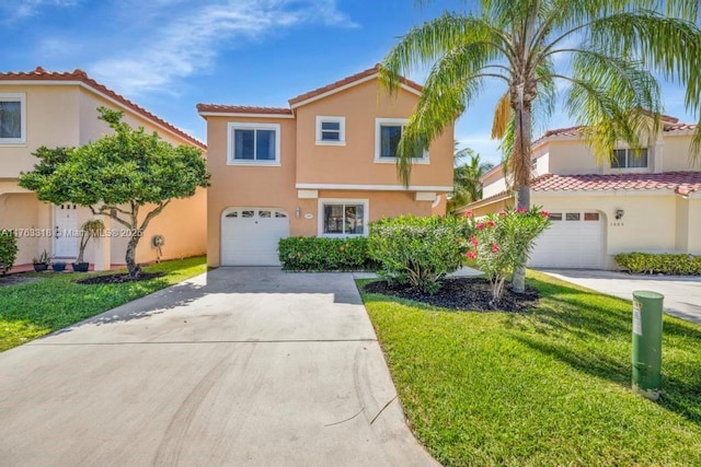 1091 SE 6th Ave, Dania Beach, FL 33004 - mediterranean / spanish home featuring a garage, a tile roof, stucco siding, a front lawn, and driveway