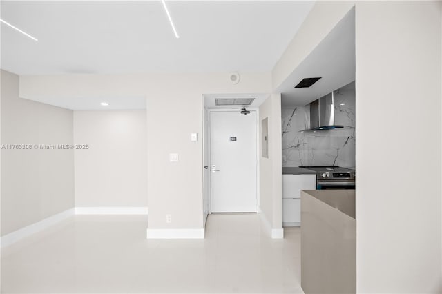 20379 W Country Club Dr Unit 1938, Aventura, FL 33180 - kitchen featuring tasteful backsplash, stainless steel electric range oven, white cabinetry, wall chimney exhaust hood, and modern cabinets