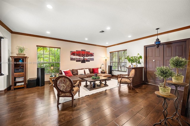 living area featuring wood-type flooring, recessed lighting, and visible vents