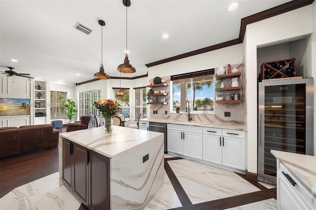 kitchen featuring open shelves, dishwasher, beverage cooler, recessed lighting, and ornamental molding
