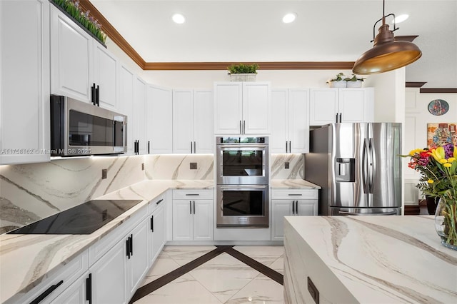 kitchen featuring ornamental molding, marble finish floor, recessed lighting, white cabinets, and stainless steel appliances