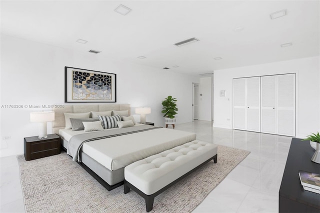 bedroom featuring a closet and visible vents