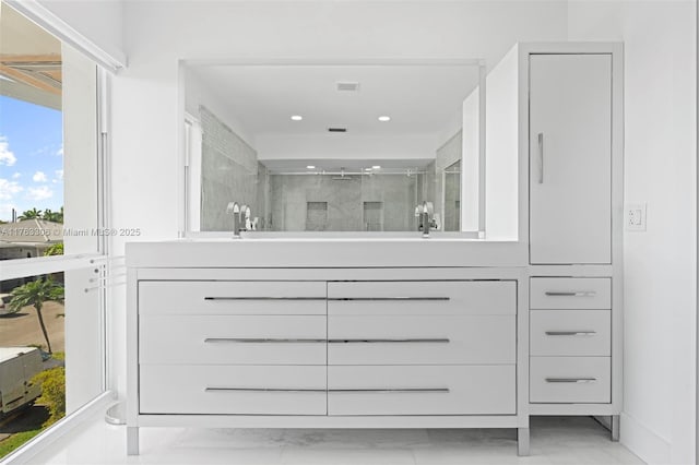 full bath featuring recessed lighting, visible vents, and a shower stall