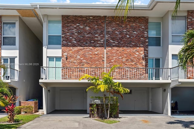 view of front of property featuring brick siding