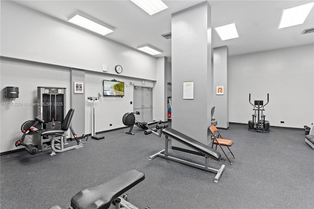 gym featuring visible vents and baseboards