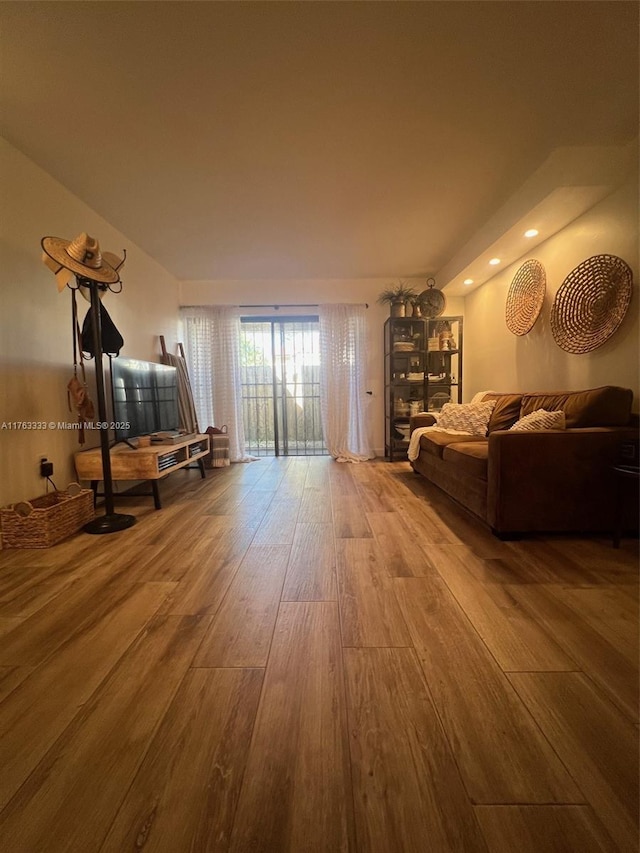 living room with wood finished floors