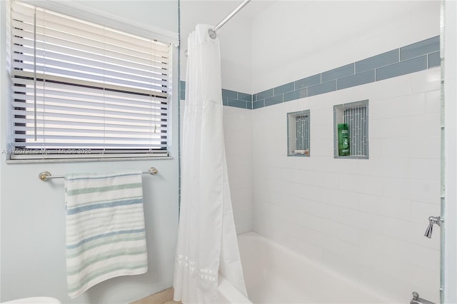 full bath with shower / bath combo with shower curtain