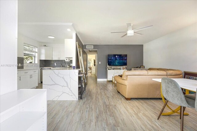 1 Keswick A 1, Deerfield Beach, FL 33442 - living room featuring ceiling fan, light wood-style floors, and recessed lighting